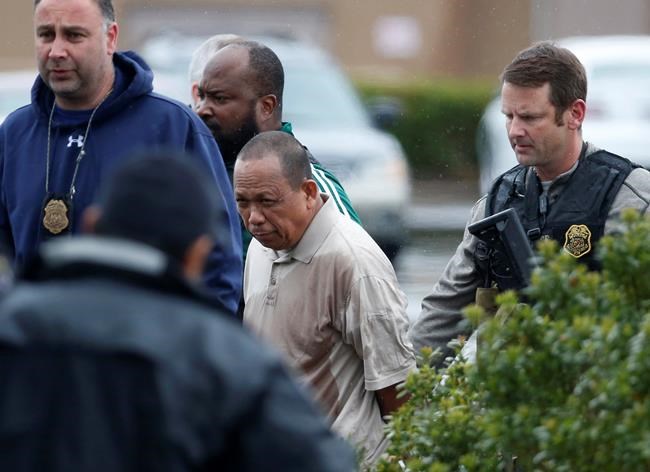 The Latest: Man accused of killing 3 held without bond | iNFOnews.ca CP684904400