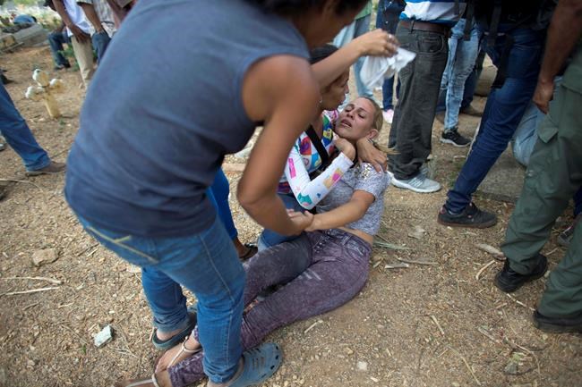 Venezuelan jail dead buried in mass tomb as questions linger | iNFOnews.ca