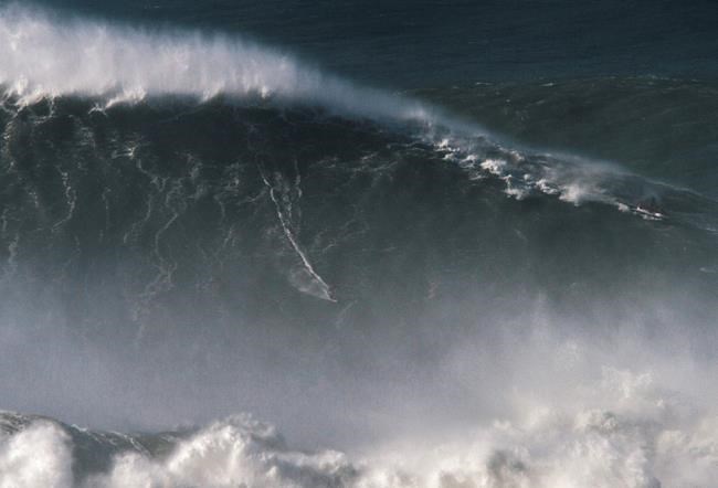 Awesome! Brazilian surfs record 80-foot wave in Portugal | iNFOnews.ca Awesome! Brazilian surfs record 80-foot wave in Portugal | iNFOnews.ca