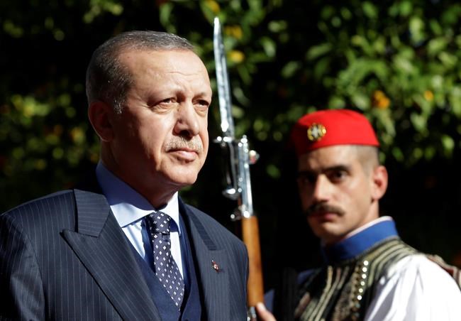 The Latest: Erdogan's visit to Greece starts on tense note | iNFOnews.ca CP2031460241
