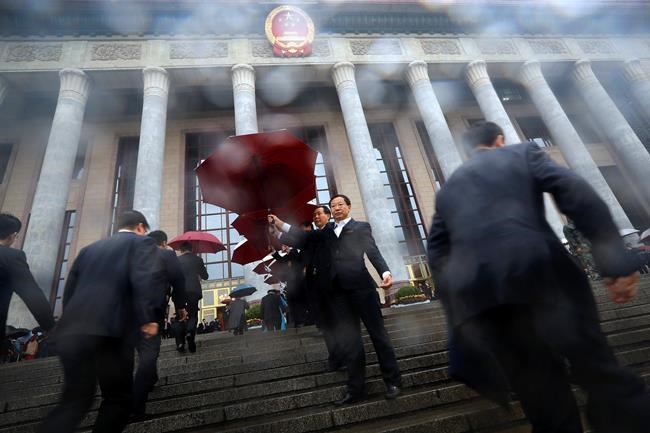 Image of Asia: Delegates arrive in rain at China congress | iNFOnews.ca