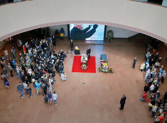 Hundreds come to bid farewell to slain journalist in Ukraine | iNFOnews.ca