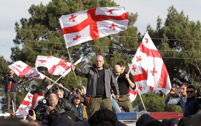 Georgia's 1st woman president is inaugurated amid protests | iNFOnews.ca