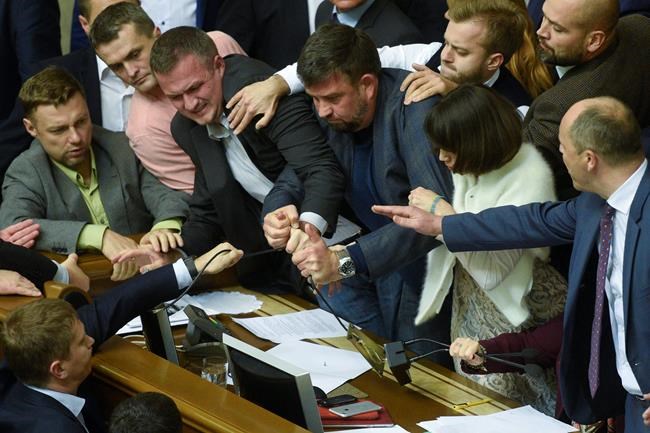 Scuffles erupt in Ukrainian parliament over disputed bill | iNFOnews.ca
