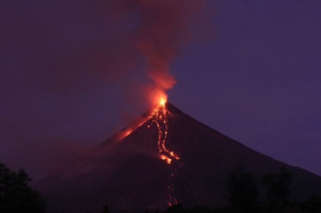 Heavy ash fall from Philippine volcano halts motorists | iNFOnews.ca Heavy ash fall from Philippine volcano halts motorists | iNFOnews.ca