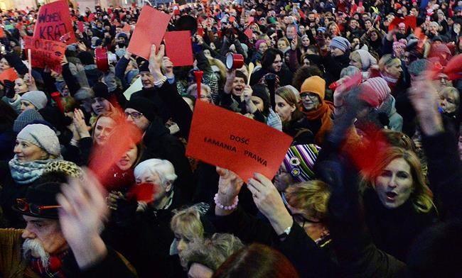 The Latest: Poland's women show the government red cards | iNFOnews.ca