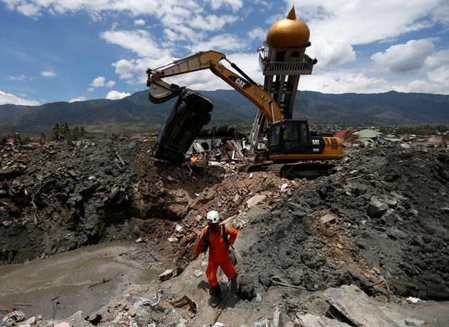 Confirmed deaths near 2,000, still more likely in Indonesia | iNFOnews.ca CP1952310379