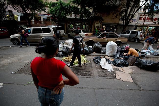 As hunger mounts, Venezuelans turn to trash for food | iNFOnews.ca