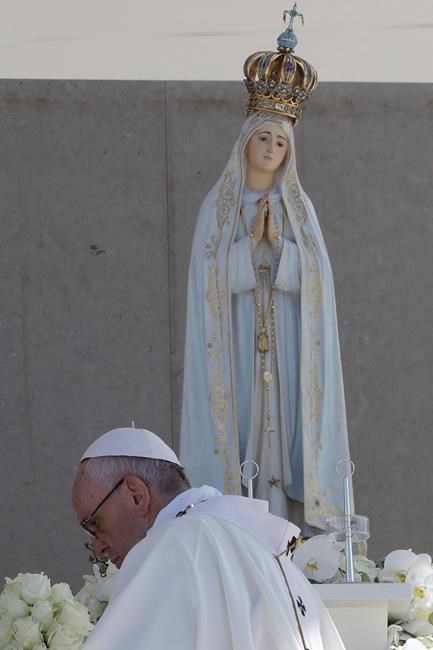 The Latest: Half-million witness pope's adding 2 new saints | iNFOnews.ca