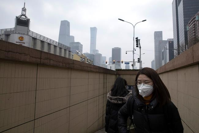 Mask-clad Chinese workers cautiously return to the office | iNFOnews.ca Mask-clad Chinese workers cautiously return to the office | iNFOnews.ca
