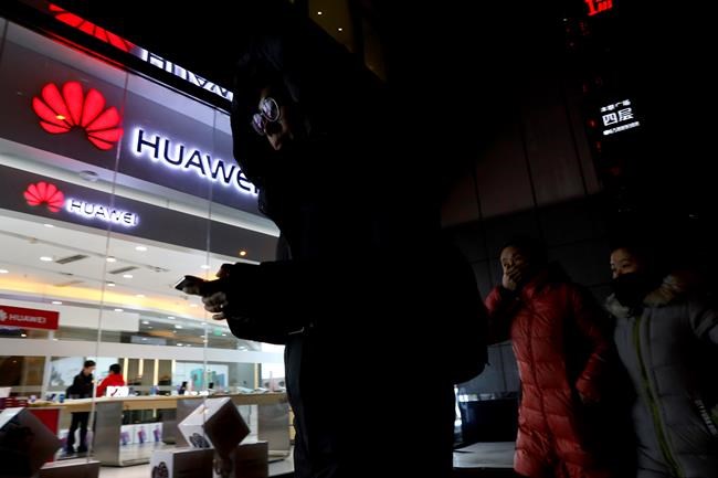 The Latest: Huawei awaits 'right conclusion' in CFO's arrest | iNFOnews.ca CP195136380