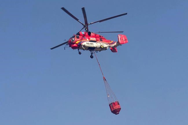 Firefighters contain fire in China's mountains where 30 died | iNFOnews.ca Firefighters contain fire in China's mountains where 30 died | iNFOnews.ca