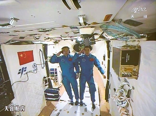 Chinese astronauts enter space station following docking | iNFOnews.ca