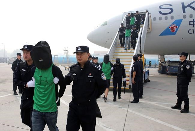 Malaysia sends 32 Taiwanese suspects to China, draws protest | iNFOnews.ca Malaysia sends 32 Taiwanese suspects to China, draws protest | iNFOnews.ca