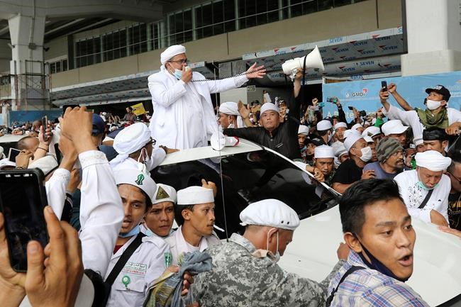 Firebrand Indonesian cleric returns from 3-year Saudi exile | iNFOnews.ca Firebrand Indonesian cleric returns from 3-year Saudi exile | iNFOnews.ca