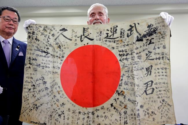 The Latest: Brother thanks US WWII vet for returning flag | iNFOnews.ca