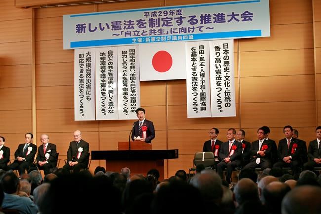 Japan PM says he will initiate debate on new constitution | iNFOnews.ca