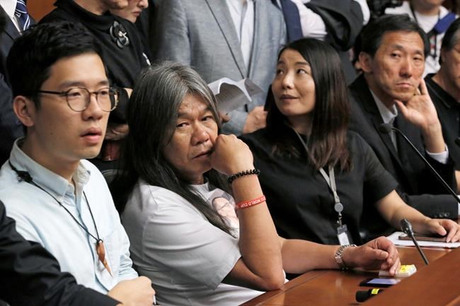 Hong Kong court disqualifies 4 lawmakers over oath taking | iNFOnews.ca