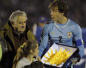 Uruguay president blasts FIFA with obscenity, calls ban of Suarez 'fascist' | iNFOnews.ca CP28963456