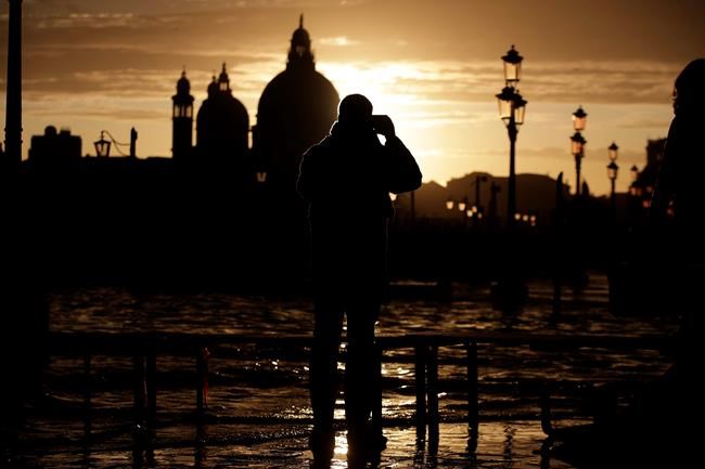 3rd record tide enters Venice as Italy hit with snow, rain | iNFOnews.ca 3rd record tide enters Venice as Italy hit with snow, rain | iNFOnews.ca