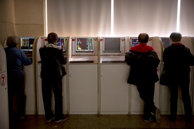 Asian markets trend lower, tracking Wall St losses | iNFOnews.ca