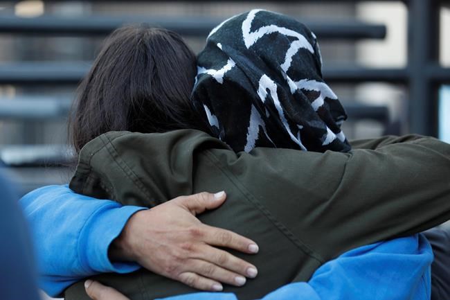 The Latest: Standoff ends as US processes asylum seekers | iNFOnews.ca