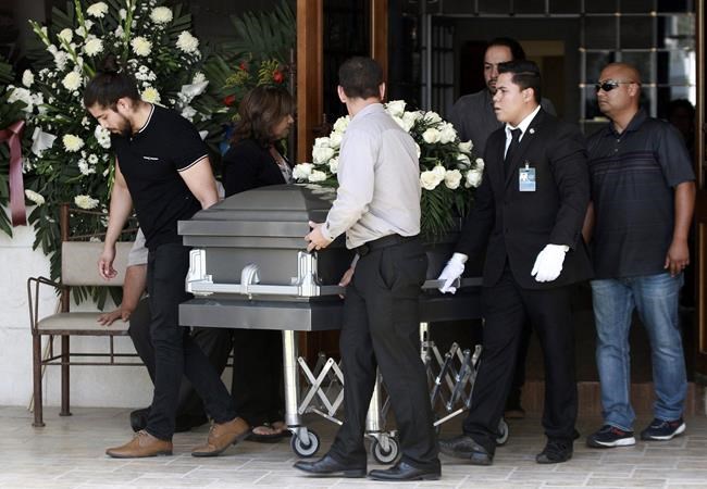 Families gather to remember victims of El Paso shooting | iNFOnews.ca CP1172911524