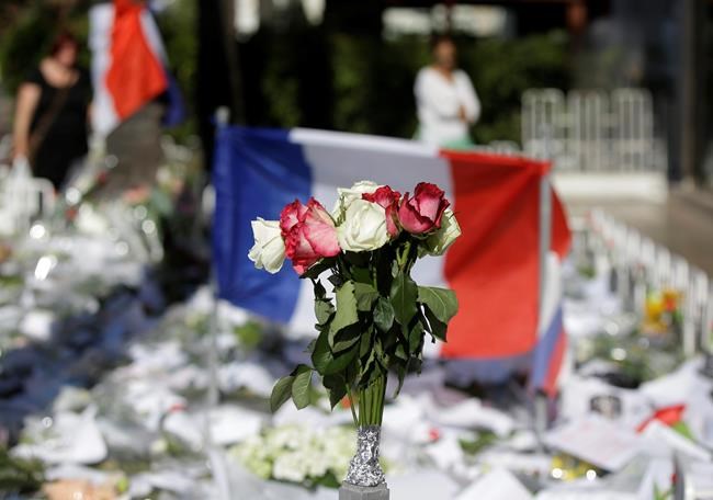 The Latest: Hollande cancels trip to Prague after attack | iNFOnews.ca