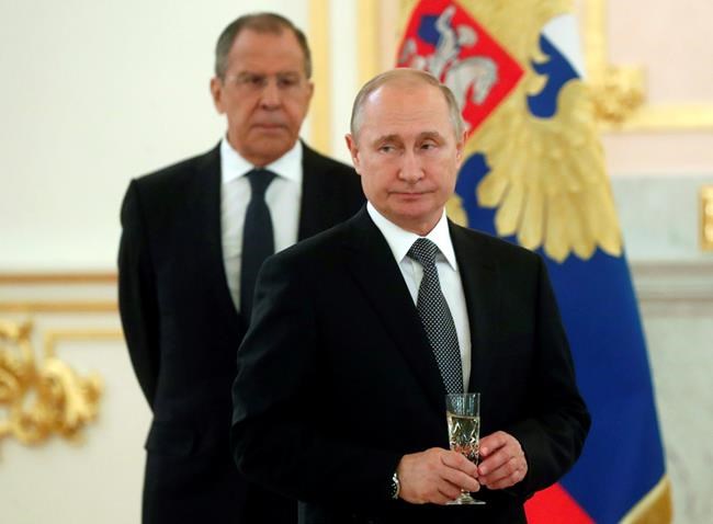 Putin signs bill suspending participation in nuclear treaty | iNFOnews.ca CP1120233467