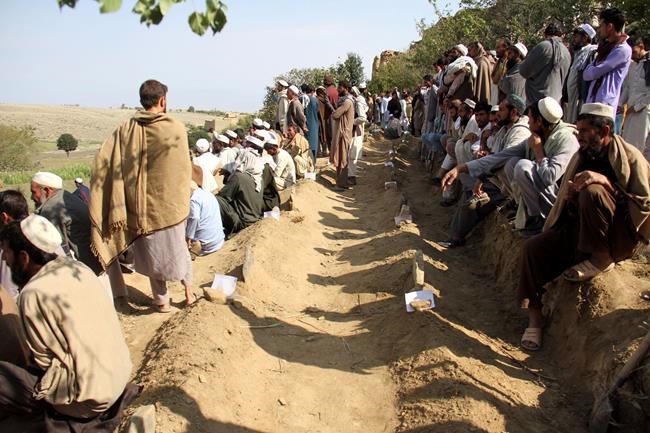 Afghan village buries its dead after mosque bombing kills 66 | iNFOnews.ca CP1160351471