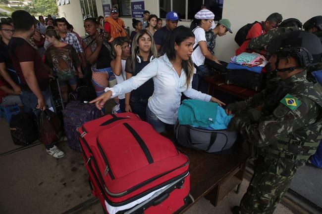 Brazil-Venezuela border reopens amid fight over refugees | iNFOnews.ca