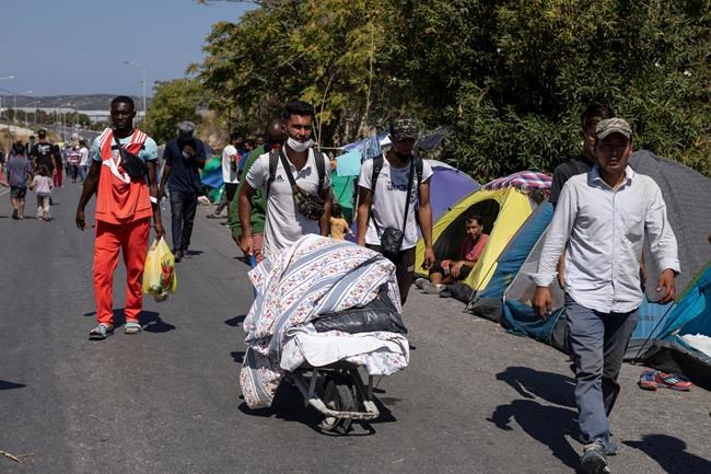 Thousands protest after Greek refugee camp burns down | iNFOnews.ca Thousands protest after Greek refugee camp burns down | iNFOnews.ca
