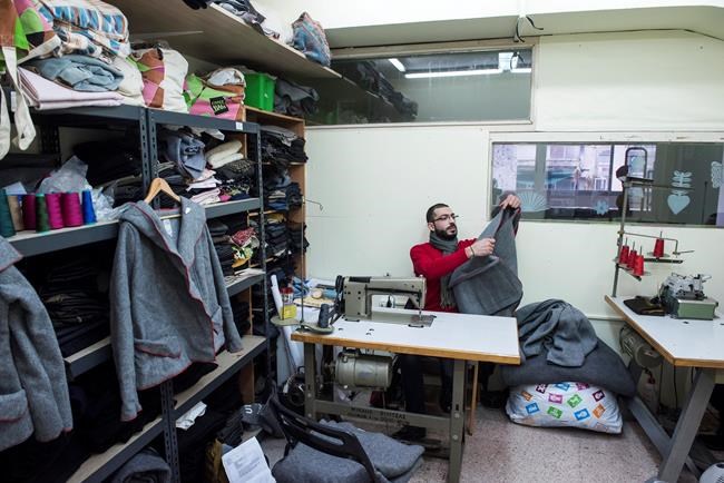 Charity turns old blankets into winter coats for refugees | iNFOnews.ca