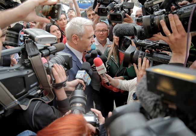 Romania's president calls on premier to resign; she refuses | iNFOnews.ca CP195239899