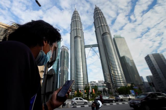 Emergency imposed in Malaysia over virus is reprieve for PM | iNFOnews.ca