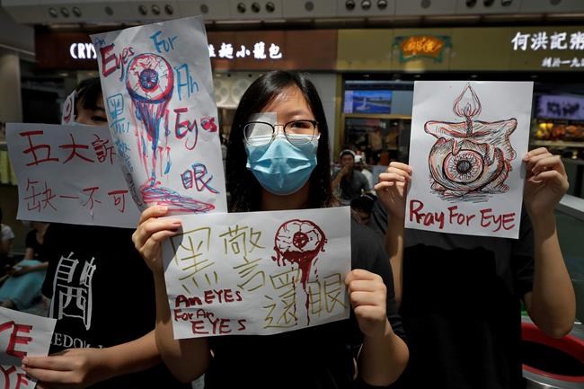 The Latest: Hong Kong airport to restart flights Tuesday | iNFOnews.ca CP296868081