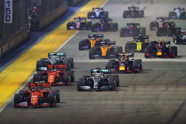Vettel ends 13-month winless run; Ferrari 1-2 at Singapore | iNFOnews.ca