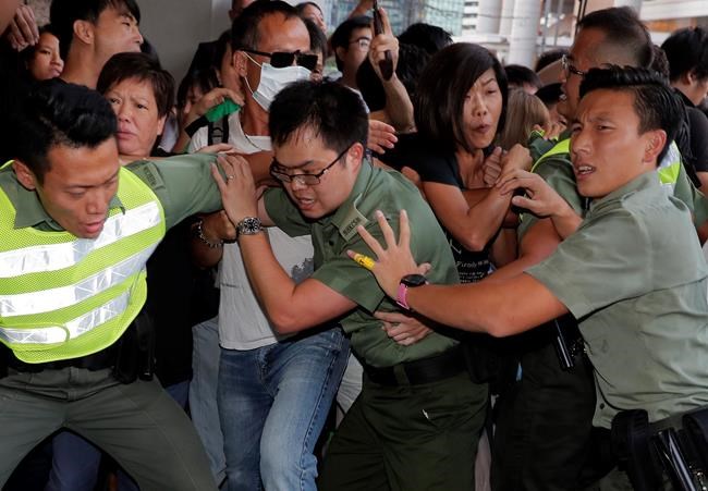 Young leaders of massive 2014 Hong Kong protests get prison | iNFOnews.ca
