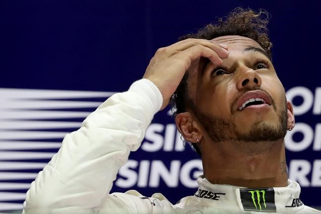 Hamilton wins Singapore GP as title rival Vettel crashes | iNFOnews.ca CP1123969709