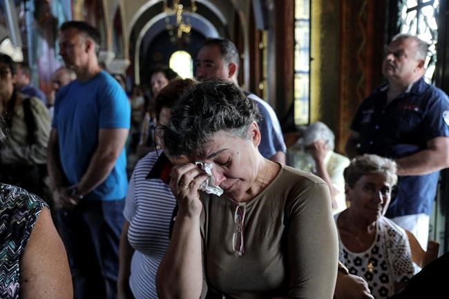 The Latest: Candlelight vigil held for victims of Greek fire | iNFOnews.ca The Latest: Candlelight vigil held for victims of Greek fire | iNFOnews.ca