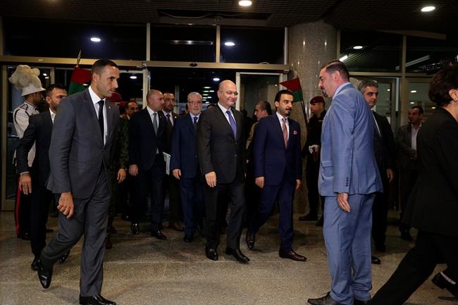 Iraq lawmakers confirm new government, key posts left empty | iNFOnews.ca