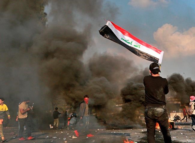 Iraq officials: 1 dead as protesters take a Baghdad highway | iNFOnews.ca