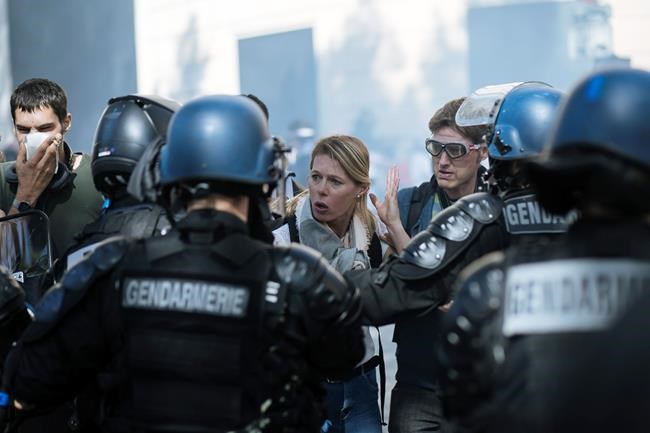 Paris police repeatedly use tear gas on day of protests | iNFOnews.ca