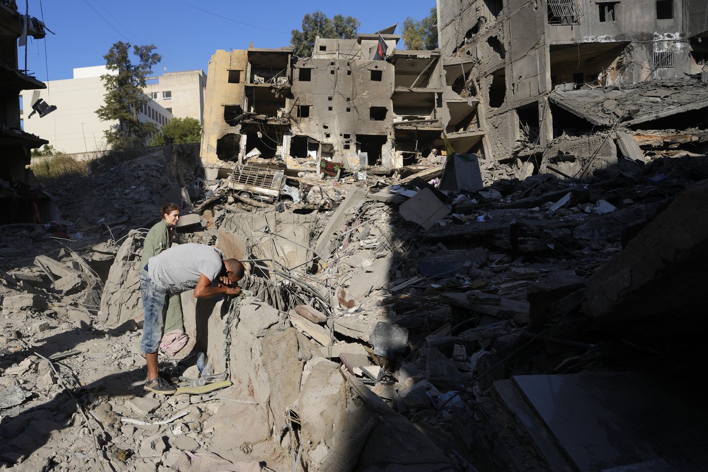 AP images offer a close-up look at the smoldering site of Nasrallah's assassination | iNFOnews.ca