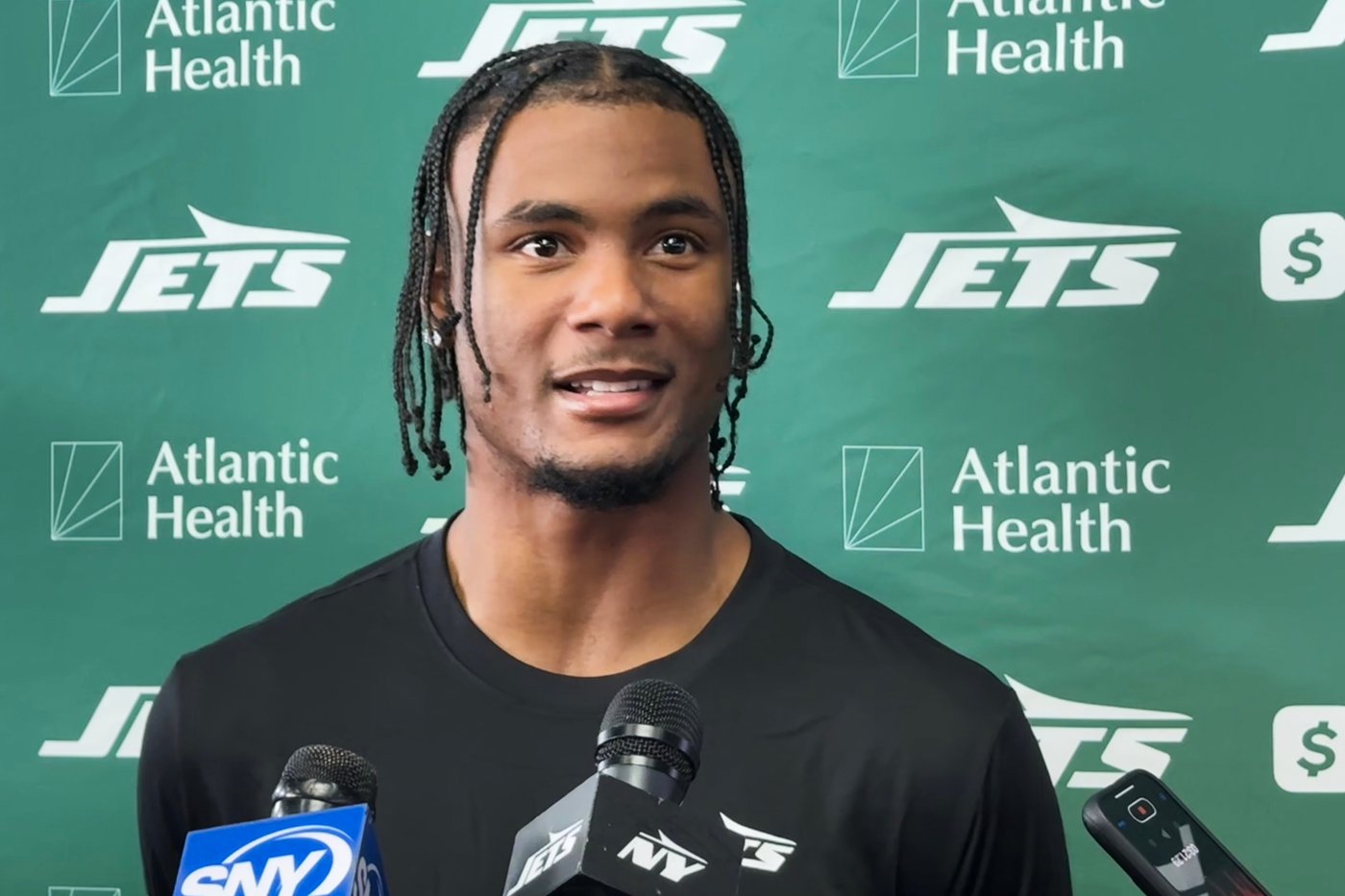 Adonai Mitchell and John Metchie III excited for fresh starts after coming to Jets in big trades | iNFOnews.ca