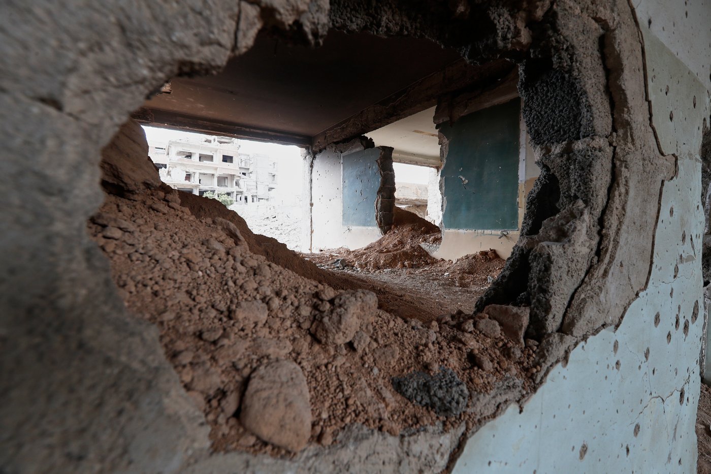 Photos show Syrian students returning to schools stripped bare by conflict | iNFOnews.ca