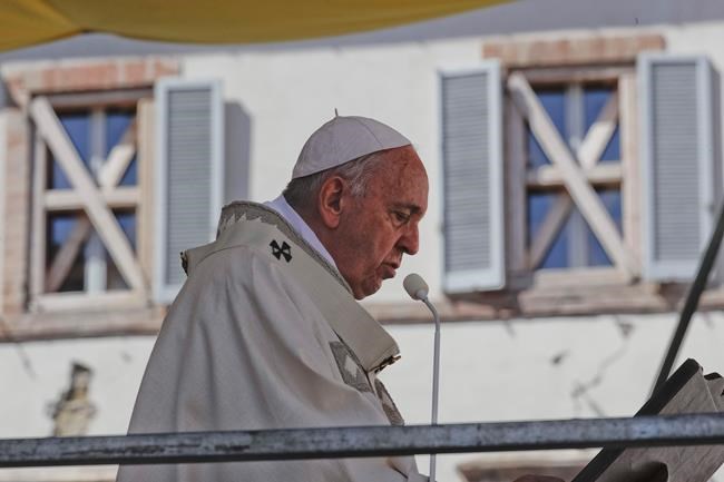 Pope dons helmet to enter earthquake-hit cathedral in Italy | iNFOnews.ca