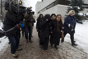 Family silent as they leave Ottawa court after son's terror case held over | iNFOnews.ca CP31827151