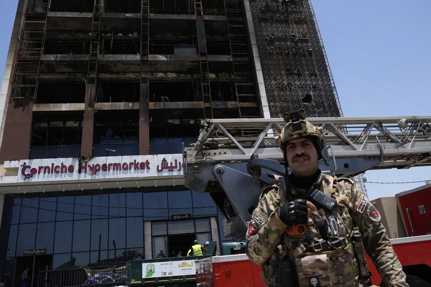 Officials try to identify 18 bodies in deadly Iraq shopping mall fire | iNFOnews.ca Officials try to identify 18 bodies in deadly Iraq shopping mall fire | iNFOnews.ca