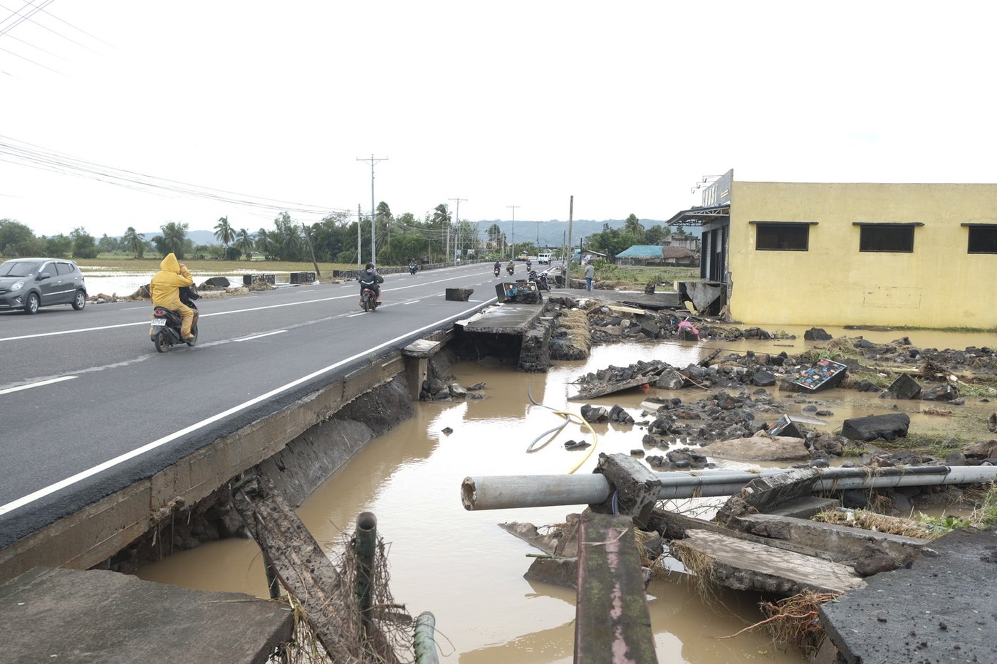 Floods in Philippines kill at least 9 and trap others on roofs as storm approaches | iNFOnews.ca Floods in Philippines kill at least 9 and trap others on roofs as storm approaches | iNFOnews.ca
